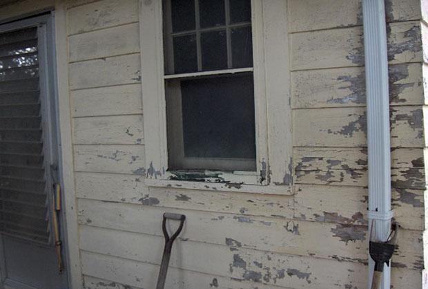 peeling left side of house